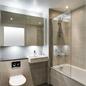 Flat Pack Bathroom Pod with Toilet, Shower in Bath with Glass Screen down the side